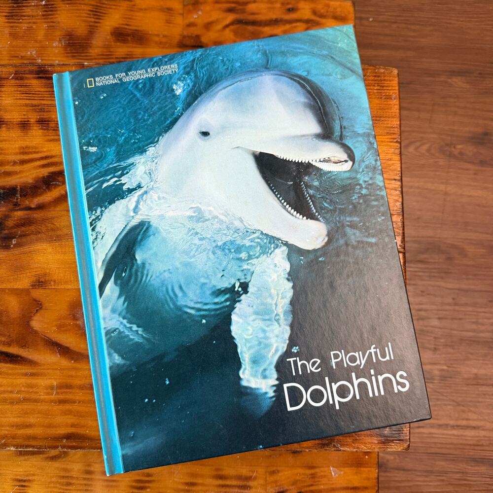 Vintage 1976 National Geographic The Playful Dolphins Hardcover Book